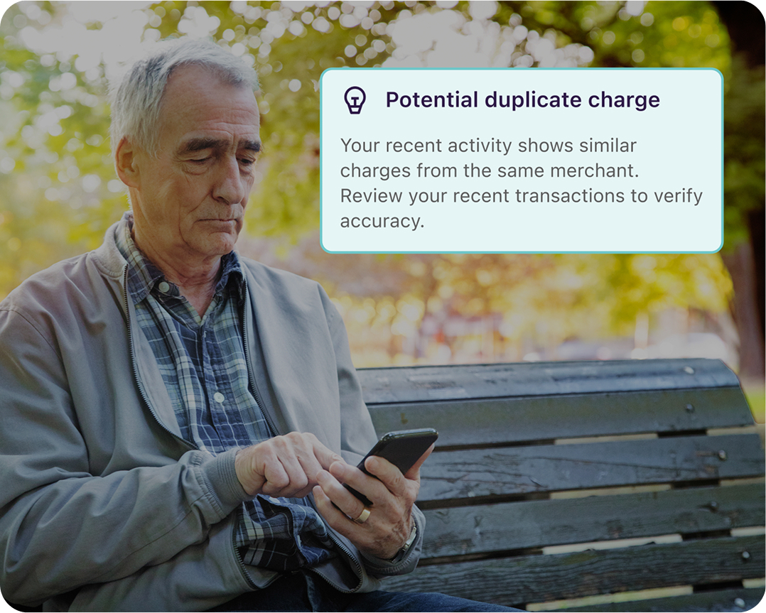 Image of man receiving Truist assist notification that there's a duplicate charge on his account.