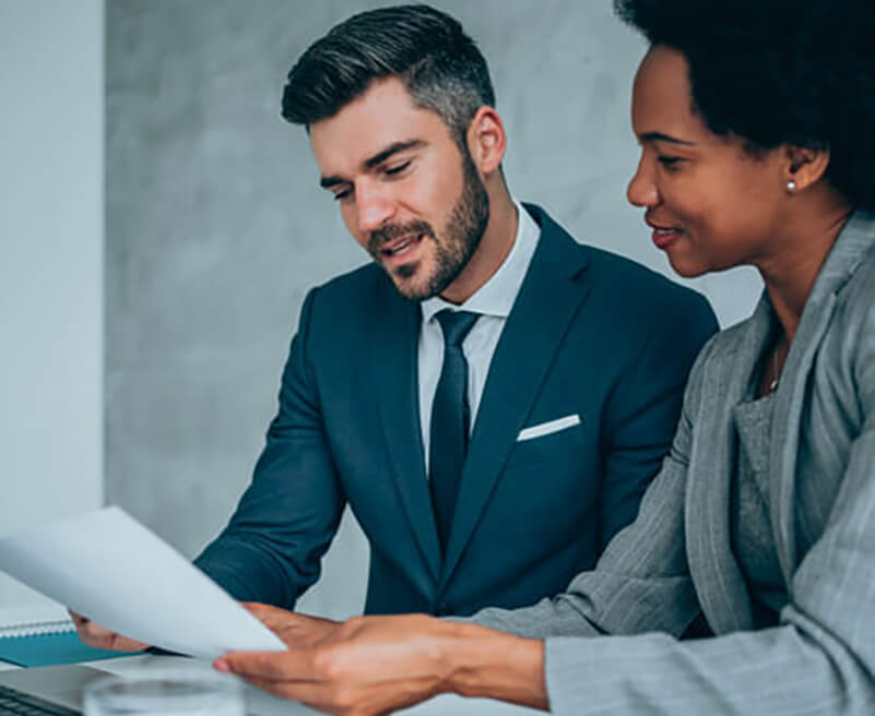 3 generations of men walking in corn field