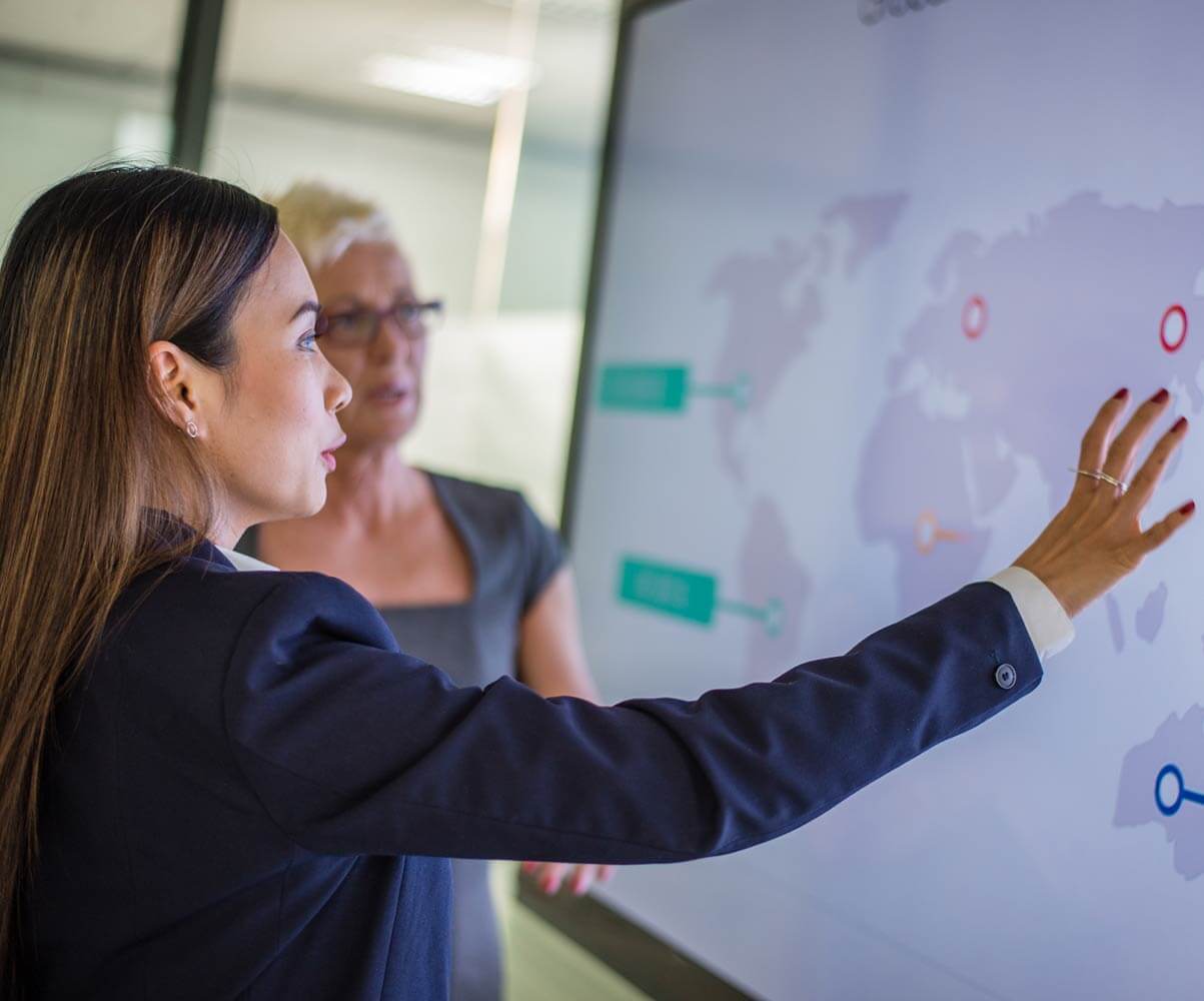 woman looking at map onscreen