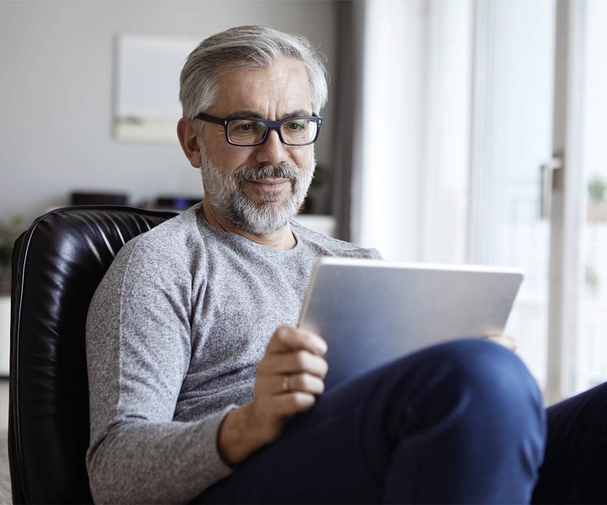 man looking at a document