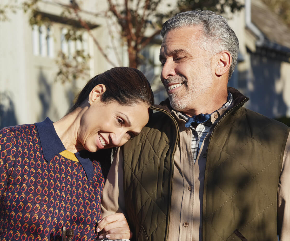 couple outdoors hugging