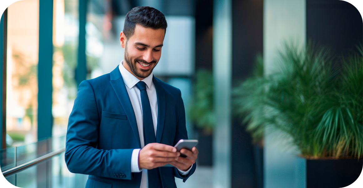 Business man looking a mobile device